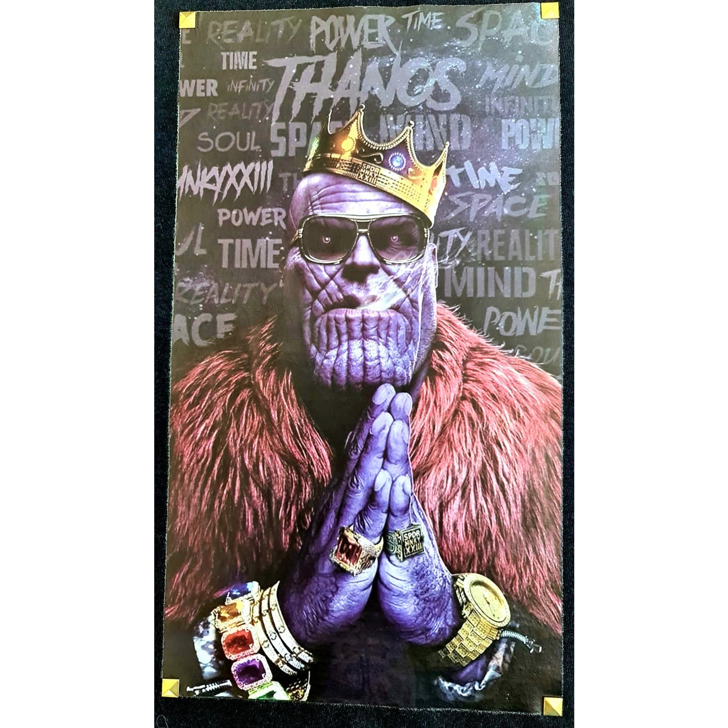 Black t-shirt featuring a graphic of Thanos wearing a crown and fur coat in a gangster style